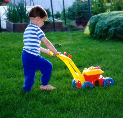 William Helping Dadda Mow the Lawn